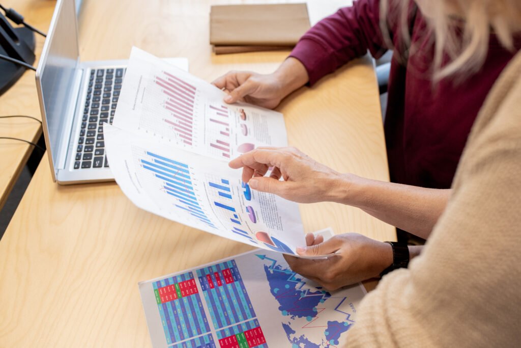 "Broker reviewing NDIS company sale papers."